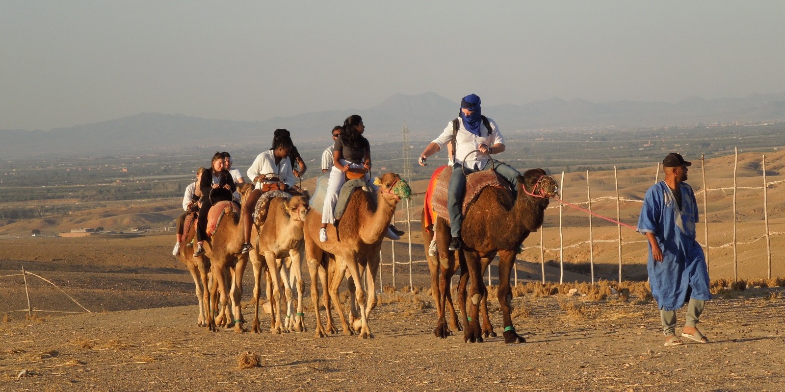 Camel Ride in Marrakech during sunset in the desert